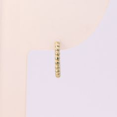 14K 15mm Solid Gold beaded Huggie Hinged Hoop Earring, Dotted Huggie Hoop, Gold Huggie, Small Gold Hoop, Cartilage, Conch, Helix, Tragus Please note that this earring is made to order. S P E C S ♦ All of our jewelry is handmade in our studio in Seoul, Korea. ♦ 14K Yellow Gold, 14K Rose Gold ♦ Listing is for 1 Earring ♦ Huggie Dimensions: - outer diameter approximately 15 mm - inner diameter approximately 12 mm - hoop thickness 2 mm - post thickness 0.9mm - post length 7mm ♦ Metal Finish: High Sh Gold Hoop Earrings With Spacer Beads, Gold Small Hoop Earrings With Spacer Beads, Adjustable Stackable Hoop Earrings, Small Gold Hoops, Seoul Korea, Everyday Earrings, Gold Hoops, Tragus, Gold Hoop