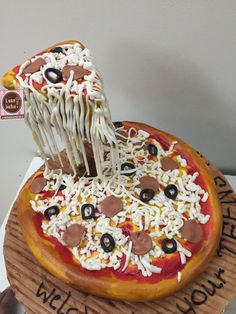 a pizza that is on top of a wooden board