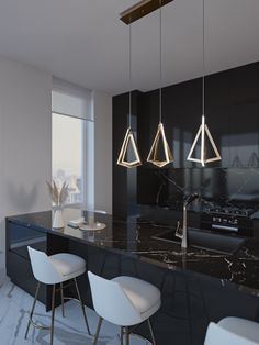 three lights hanging from the ceiling over a kitchen island with marble counter tops and white chairs