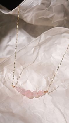 This beautiful and elegant Rose Quartz necklace - features the gentle and soothing gemstone that symbolizes the essences of unconditional love and a warm embrace. This bracelet is handcrafted with premium gold plated anti-tarnish brass wire. Designer grade A faceted rose quartz imported from Japan will dress up any outfit and its simple design allows it to be stackable with any other pairings! All pieces are made with lots of love! I hope that my creations can spark some joy into your hearts &lt Elegant Birthstone Necklace With Natural Stones For Everyday, Elegant Everyday Birthstone Necklace With Natural Stones, Minimalist Birthstone Necklace For Mother's Day, Minimalist Rose Quartz Crystal Necklace For Gift, Minimalist Rose Quartz Crystal Necklace Gift, Rose Quartz Healing Necklace, Elegant Healing Jewelry For Mother's Day, Dainty Crystal Necklace With Adjustable Chain For Healing, Delicate Crystal Necklace As Gift