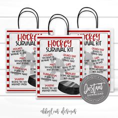 two red and white shopping bags with the words hockey survival kit written on each bag