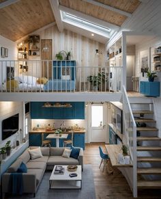 a living room filled with furniture next to a kitchen and dining area in a loft