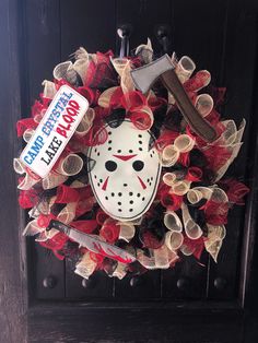 a hockey mask wreath on the front door