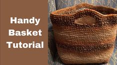 a basket sitting on top of a blue chair next to a brown and white wall