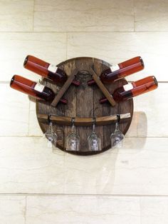 a clock made out of wine bottles on a wall