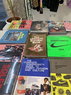 there are many different books on the table