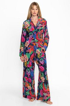 Crafted from 100% luxurious silk, the Jaclyn Long Set Pajamas are adorned with vibrant floral color. Featuring a button-down long sleeve top and wide-leg pants with an easy elastic waist, these sumptuous pajamas are finished with pockets at the side seams. Pair with the Cozy Robe and coordinating slippers for a relaxing night in. Johnny Was Women's Jaclyn Long Pajama Set in Emberwing Pink, Size XS, Silk, Floral Elegant Multicolor Floral Print Sets, Multicolor Long Sleeve Silk Sets, Multicolor Silk Long Sleeve Sets, Elegant Multicolor Silk Set, Silk Floral Print Long Sleeve Sets, Multicolor Floral Print Silk Set, Silk Multicolor Floral Print Set, Multicolor Floral Silk Set, Multicolor Silk Set With Floral Print