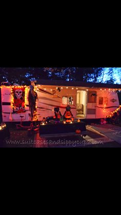 the trailer is decorated with christmas lights and decorations