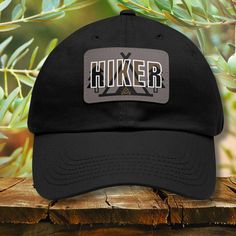 Stay stylish on the trails with our Hiker Dad Hat! This vintage hiking hat is perfect for exploring national parks, hiking through scenic hiking trails, or enjoying some time in the great outdoors. It's a must-have hiking gear cap for any nature lover, blending comfort and style for every adventure. Whether you're a happy camper or looking for the perfect camper gift, this tent camping hat makes a great addition to your outdoor wardrobe. Ideal as a hiking trip hat or a trail gift hat, it's designed for those who love the outdoors. Whether you're gearing up for your next camping trip hat or simply need a versatile accessory, this nature lovers hat is just the thing for every adventure. These Dad hats come with an unstructured, six-panel, low-profile and a pre-curved visor for that signature Hiking Hats For Women, Zelt Camping, Camping Hat, Vintage Hiking, Adventure Hat, Hiking Hat, Hiking Gifts, Gifts For Campers, Vintage Camping