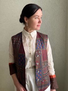 Lovely Vintage double vest . Elegant and feminine.  COMPOSITION: polyester, silky fabric .  Tags size DE42/GB16, will fit sizes M/L.  Model is size M and 170 cm growth. **No holes or spots!! Great vintage condition! You can complete the look with the blouse from the photos:  https://youradorablevintage.etsy.com/listing/1626638823 **Choose vintage and add something amazing to your wardrobe! **This item will come to you freshly laundered and ready to wear. **Discount for wholesale Fitted Multicolor Patchwork Vest, Multicolor Patchwork Fitted Vest, Multicolor Sleeveless Vest For Fall, Sleeveless Patchwork Outerwear For Summer, Multicolor Patchwork Vest, Fitted Multicolor Vest For Fall, Vintage Vest, Vest Outfits, Womens Vest