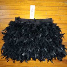 Black Feathered Mini Skirt Size Small Black Skirt For Costume Party In Spring, Black Skirt For Spring Costume Party, Black Lined Skirt For Costume Party, Black Bottoms For Costume Parties In Summer, Black Bottoms For Summer Costume Party, Black Party Bottoms With Feather Trim, Feather Skirt, Black Feathers, Mini Skirt