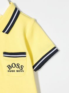 Yellow cotton-blend stripe trim polo shirt from BOSS Kidswear featuring stretch-design, ribbed detailing, embroidered logo at the chest, stripe trim, polo collar, front button fastening and short sleeves. | Boss Kidswear Stripe Trim Polo Shirt Casual Short Sleeve Polo Shirt With Striped Cuffs, Cotton Polo Shirt With Striped Cuffs, Casual Polo Shirt With Contrast Trim, Casual Collared Polo Shirt With Contrast Trim, Summer Polo Shirt With Contrast Collar And Short Sleeves, Summer Polo Top With Contrast Collar, Cotton Collared Top With Striped Cuffs, Sporty Tops With Polo Collar And Contrast Collar, Collared Tops With Contrast Trim For Summer