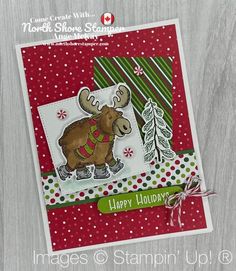 a close up of a christmas card with a moose and snowflakes on it