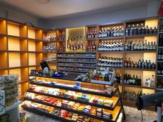 a store filled with lots of bottles and shelves