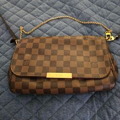 Excellent Condition Bought A Few Years Ago At Neiman Marcus. Has Long Strap And Smaller Metal Strap. A Few Scratches On The Metal Plate And A Few Marks In The Interior. Normal Wear... Will Include The Box. I Do Not Have The Cloth Protector Louis Vuitton Favorite Mm, Favorite Mm, Louis Vuitton Favorite, The Cloth, Bags Louis Vuitton, Metal Straps, Metal Plate, Louis Vuitton Bags, Louis Vuitton Bag