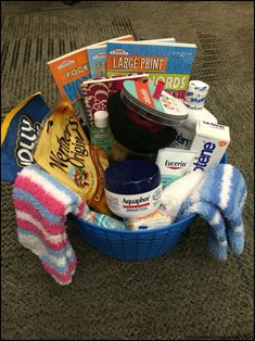 a basket filled with lots of items on top of a carpeted floor next to a pair of gloves