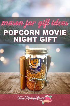 a mason jar filled with popcorn movie night gift