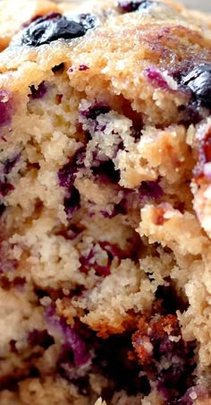 a close up of a blueberry muffin on a plate