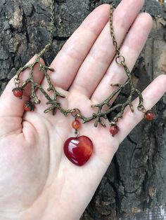 Nature-inspired Amber Pendant Necklace, Handmade Agate Necklace With Nature-inspired Style, Bohemian Heart-shaped Natural Stone Necklace, Bohemian Heart-shaped Necklace With Natural Stones, Heart-shaped Carnelian Necklace For Gift, Rustic Agate Jewelry For Gifts, Rustic Agate Jewelry Gift, Unique Heart-shaped Necklaces With Natural Stones, Handmade Bohemian Carnelian Crystal Necklace