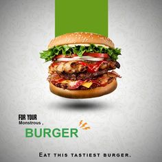 a burger with meat, lettuce and tomato on it in front of a white background