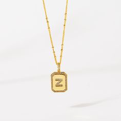 Gold Initial Pendant Necklace 18-20"– Think Goodness Gold Initial Pendant Necklace With Name, Gold Monogram Initial Pendant Necklace, Gold Initial Necklace With Rectangular Pendant, Gold Square Pendant Initial Necklace For Anniversary, Gold Initial Necklace With Square Pendant For Anniversary, Gold Initials Necklace As Personalized Gift, Gold Initials Name Necklace, Personalized Gold Initial Necklace Gift, Gold Initial Pendant Charm Necklace For Anniversary