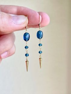 Blue Sapphire Quartz Earrings, September Birthstone, Navy Blue Long Earrings in Gold or Silver, Oval Beaded Boho Jewelry, Mother's Day Gift These modern and light weight earrings feature rich Blue Sapphire Quartz oval gemstones wire wrapped to tiny blue quartz rondelles. The earrings end on a pointy gold filled or silver element. The earrings are suspended from lever back ear wires in the finish of your choice.  These earrings have a beautiful deep navy blue hue which will match absolutely every Silver Element, Beaded Boho Jewelry, Silver Gift Wrap, Beading Jewelery, Earrings Gemstone, Handmade Jewelry Tutorials, Earrings In Gold, Blue Quartz, September Birthstone