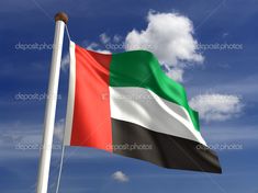 the flag of united arab emirates blowing in the wind against a blue sky with white clouds