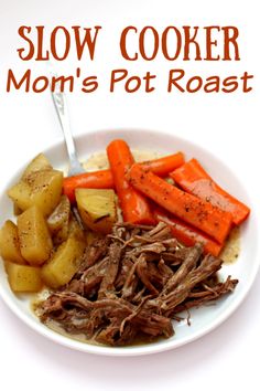 a white plate topped with meat, potatoes and carrots