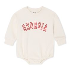 Let your mini fans flaunt their love for game day with our personalized embroidered sweatshirt bubble. You get to pick the name and thread hue! Crafted from 100% cotton, the Unisex Sweatshirt Bubble Romper features your chosen name embroidered in the color of your preference. So go ahead, dress your little one up in our Game Day Sweatshirt Bubble, and root for your favorite football team! Perfect for football fan babies, this outfit will have them scoring all the cute points. Team-colored Cotton Sweatshirt For Game Day, Game Day Cotton Sweatshirt With Embroidered Logo, Game Day Cotton Tops With Embroidered Logo, School Spirit Tops With Embroidered Logo For Game Day, Game Day Tops With Embroidered Logo, Collegiate Sweatshirt With Letter Embroidery For Game Day, Cotton Sweatshirt With Embroidered Logo For Game Day, Team-colored Cotton Sweatshirt For School Spirit, Collegiate Cotton Sweatshirt For Game Day