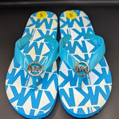 Michael Michael Kors Girls Turquoise Jet Set Flip Flop Nwt Size 5 Mk Girls Logo Print Thong Flip Flop Sandals, Manmade Materials. Silver Hardware Mk Logo Big Girls Size 5, Fits Women's Size 6, 6.5 Colors Can Vary On Screens. These Are A Turquoise / Teal Color. New, New With Tags, New In Box, Nwt, Nib, Never Worn. Box Does Have My Handwriting "Turquoise Flops" Written On Them, As Shown In Photo. Fyi, These Are Hard Flops! Not Soft Or Very Comfortable Imo. Ask Me Anything! Mk Sandals, Toddler Sandals Girl, Girls Flip Flops, White Leather Sandals, Michael Kors Sandals, Kids Flip Flops, Toddler Sandals, Pink Sandals, Mk Logo