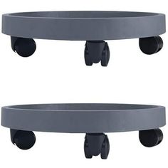 two round metal shelves with wheels on each one and the other side, both in grey