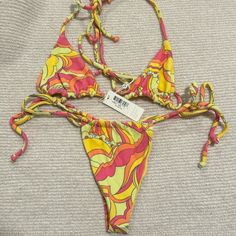 Brand New Unworn Top Comes With Tags Size L Set A Frankies Bikinis X Wildflower Cases Exclusive, Features The Softest Terry Fabric Final Sale/No Returns Retro Swimwear For Beach Party Season, Retro Swimwear For Beach Party, Retro Triangle Top Swimwear For Beach, Retro Swimwear For Summer Beach, Retro Printed Swimwear For Beach Season, Retro Summer Swimwear For Vacation, Yellow Tie-side Bottom Swimwear For Beach, Retro Tie-side Bottom Swimwear For Poolside, Retro Orange Swimwear For The Beach