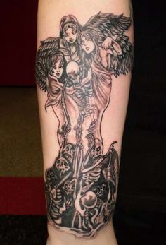 a tattoo on the leg of a person with an angel and demon design on it