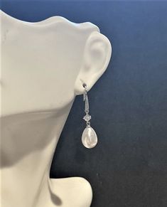 Bridal Faux Pearl Drop Earrings , CZ , Silver ,  Weddings , Engagements  1 1/4 " , Pearl & Crystal Drop Earring 1 1/4 "  Long ...These Beautiful Earrings are Elegant and Simple.... Please ask any questions as I do not accept returns! Thank You Formal Teardrop Pierced Bridal Earrings, Formal Teardrop Bridal Earrings Pierced, Formal Teardrop Bridal Earrings, Formal Pear-shaped Clip-on Earrings, Formal Pear-shaped Chandelier Earrings, Elegant Pear-shaped Jewelry For Evening, Formal Silver Pierced Pearl Earrings, Formal White Crystal Earrings With Elegant Design, Silver Pear Shaped Jewelry For Formal Occasions