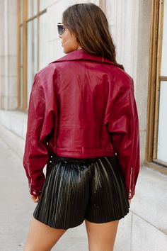 This edgy Dylan jacket will step up your wardrobe game! Its luxe faux leather and classic oversized moto style provide a timeless look that won't go out of style. Plus, the belt detailing adds just the right amount of edginess. Rock it with jeans or a skirt for a cool vibe. 55% Polyester, 45% PU Trendy Burgundy Biker Jacket With Long Sleeves, Trendy Burgundy Long Sleeve Biker Jacket, Trendy Burgundy Leather Jacket With Long Sleeves, Trendy Burgundy Leather Jacket For Fall, Trendy Burgundy Leather Jacket For Spring, Faux Leather Moto Jacket, Moto Style, Leather Moto, Leather Moto Jacket