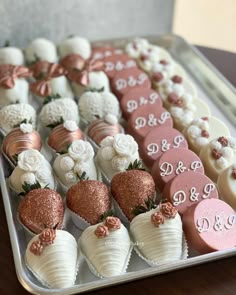 a tray filled with lots of different types of cakes