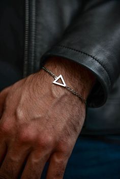 Introducing our sleek and contemporary Triangle Bracelet for men. Crafted from high-quality, nickel-free stainless steel, this silver bracelet is designed to resist tarnishing and provide lasting beauty. It is adjustable to fit wrist sizes ranging from 17-21 cm (6.7-8.3 inches), ensuring a comfortable and personalized fit. Each bracelet comes beautifully packaged in a Larrisy box and includes an organza bag. Elevate your style effortlessly with this timeless accessory.  Note: Please measure your Minimalist Silver Stainless Steel Chain Bracelet, Minimalist Bracelet With Stainless Steel Clasp For Gift, Minimalist Silver Chain Bracelet With Stainless Steel Clasp, Minimalist Sterling Silver Bracelet With Silver Chain, Minimalist Silver Stainless Steel Bracelet, Minimalist Everyday Bracelet With Stainless Steel Clasp, Minimalist White Gold Stainless Steel Chain Bracelet, Nickel-free Stainless Steel Minimalist Bracelet, Minimalist Stainless Steel Silver Chain Bracelet