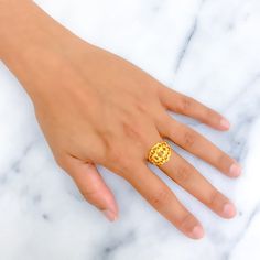 This ring, delicately crafted from 22k yellow gold and weighing 3.0 grams, displays an intricate design that exudes charm and sophistication. Available in size 7, with the option for resizing, it caters to diverse styles and preferences. Ideal for those who appreciate detailed artistry and the timeless allure of gold, this piece enhances any jewelry collection with its refined elegance and captivating detail. Product Details Gold Purity(karat): 22k Gold Weight(grams): 3.0 Item Finish: Yellow Gold Ring Size: ﻿7﻿ Ring Sizing Available: Yes // 22k Yellow Gold Open Ring Jewelry, 22k Gold Filigree Ring As Gift, 22k Yellow Gold Open Ring, Gold Filigree Ring As A Gift, 22k Gold Filigree Ring With Intricate Design, Yellow Gold 22k Temple Jewelry Rings, 22k Yellow Gold Temple Jewelry Rings, 22k Yellow Gold Ceremonial Rings, Temple Jewelry 22k Yellow Gold Rings