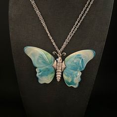 100% Of This And Every Sale From This Closet Benefits Non Profit Animal Sanctuaries And Rescues Vintage Piece Missing One Eye But Can Be Repaired. Rare Color Not Available Anywhere Online. Turquoise, Blue, Green & White Swirled Thermoset Wings. Silver Body And Chain. 20’ Double Chain, Butterfly Is 3 3/4” Wide, 2 1/2” Tall. Priced Accordingly Vintage Light Blue Handmade Jewelry, Vintage Blue Jewelry With Unique Variations, Artistic Blue Jewelry With Large Pendant, Vintage Blue Hand Painted Jewelry, Vintage Blue Hand-painted Jewelry, Vintage Hand Painted Blue Jewelry, Artistic Blue Metal Jewelry, Unique Blue Butterfly-shaped Jewelry, Unique Blue Butterfly Jewelry