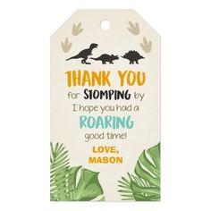 a thank card with dinosaurs and leaves on the tag, says thank you for shopping by