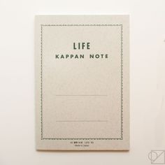 a notebook with the words life kappan note written in green on it's cover