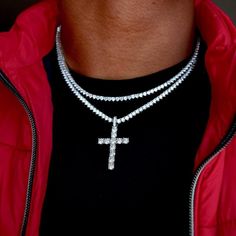 Bring the blessings and the bling, with the oh so icy Iced Diamond Cross Bundle in white gold. This 3-in-1 package offers insane value, pairing our timeless Iced Diamond Cross Pendant with TWO Round Cut Diamond Tennis Necklaces in lengths carefully selected to compliment in the perfect layered look. Claim the light and catch the light from every angle in Heaven or Earth! Specifications Length: 16" and 18" or 18" and 20" Width: 3mm Weight: (Weight can vary up to 5 grams) 18k White Gold Plated: 16 Tala By Kyla, Hip Hop Chains, Couple Necklace, Saudi Gold, Expensive Jewelry Luxury, Diamond Tennis Necklace, Diamond Ice, Money Magnet, Tennis Chain