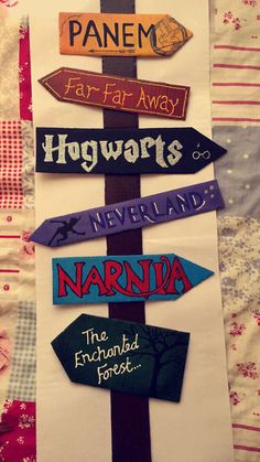 a sign that has many different types of signs on it, including one for harry potter and the other for narnia