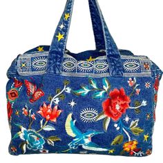 Imported Zipper Closure Dry Clean Only 100% Cotton Embroidered Zipper Cara Denim Duffel Tote Bag Light Blue Denim Embroidered Tote Bag Casual Blue Embroidered Shoulder Bag, Casual Blue Embroidered Bag, Blue Embroidered Denim Bags, Blue Embroidered Everyday Bag, Casual Embroidered Denim Bag, Blue Embroidered Everyday Shoulder Bag, Blue Bohemian Bag With Pockets, Blue Bohemian Bags With Pockets, Everyday Tote Bag