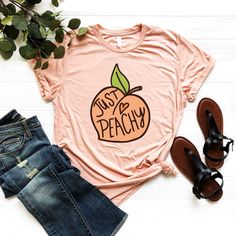 Just Peachy Shirt, Peach Lover Shirt, Cute Peach Shirt, Retro Peach Shirt, Springtime Tee, Retro Vibe Shirt, Peach Shirt, Funny Festival Tee Ordering Process for our valued customers  ~ Please follow all steps to place an order. ~ Please select the shirt type and size. ~ Please select color of the shirt from drop down options. ~ If you want to purchase more than 1 , add current item to your cart and then you can click back, add more items for each shirts. ~ Once all your desired items , you can Trendy Heather Peach T-shirt For Spring, Peach Pit Tshirt, Trendy Heather Peach T-shirt For Summer, Just Peachy Shirt, Tee Shirt Outfit, Peach Shirt, Junior Outfits, Just Peachy, Retro Vibe