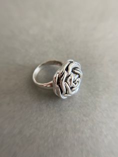 Sterling Silver Rose Rings Type A - Sterling Silver ★ Quantity : One Ring ★ Color : Silver ★ Material : Sterling Silver ★ Ring Size : 6 / 7 / 8 / 9 / 10 ★ Band Size : about 4mm wide and 1mm thick ★ Rose Size : 20mm ★ Comes in a jewelry box. If you need extra boxes for gifting....just let us know! Adjustable Rose Flower Ring, Silver Promise Ring With Roses Detail, Silver Rings With Rose Design, Adjustable Rose Design Ring, Rose Rings, Rose Ring, Ring Color, One Ring, Silver Material