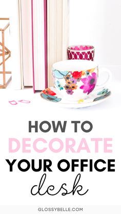 a coffee cup sitting on top of a desk next to an open book with the title how to decorate your office desk