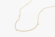 "Diamond Necklace / 14k Gold Diamond Solitaire Necklace / Dainty Diamond Necklace / Bridal Jewelry / Floating Diamond by Ferko's Fine Jewelry * Made to Order. * Gold Kt: 14K * Custom Gold Color: Rose Gold, Yellow Gold, White Gold * Round Diamond: 5 pc 1.75 MM * Total Number of Stones: 5 * Total CTW: 0.11 Ctw * Diamond Color-Clarity: G Color Si1 Clarity * Setting Type: Prong * Ready to Ship in 7-10 Business Days Be sure to hit \"favorite\" on the right so it remains in your favorites list and/ or Yellow Gold Delicate Chain Jewelry For Anniversary, Yellow Gold Wedding Chain Necklace In Fine Jewelry Style, Refined 14k Gold Necklace With Diamond Accents, Yellow Gold Fine Jewelry Chain Necklace For Wedding, Fine Jewelry Diamond Necklace With Adjustable Chain For Anniversary, 14k Gold Chain Necklace With Single Cut Diamonds, Yellow Gold Necklaces With Single Cut Diamonds For Anniversary, Refined Gold Diamond Necklace For Anniversary, Refined Gold Necklace With Diamond Accents