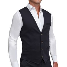 Our solid navy stretch suit vest is crafted from a performance fabric blend that is extremely stretchy while still providing an incredibly professional appearance. This vest is lined with our dress shirt fabric making it lightweight, breathable, and moisture-wicking. It also features our signature athletic fit that rewards those with an athletic physique. Vest design details: Single-breasted 4-button closure Rear adjustment clinch Jetted pockets Brown buttons and buttonhole stitching "The Boylst Athletic Physique, Vest Design, Professional Appearance, Stretch Dress Pants, Performance Dresses, Vest Designs, Dress Shirt Sleeves, Fabric Making, Suit Vest