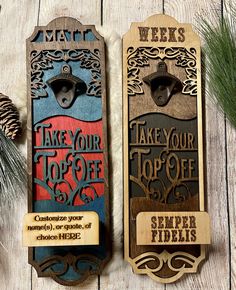 two wooden tags with the words take your top off and some pine cones